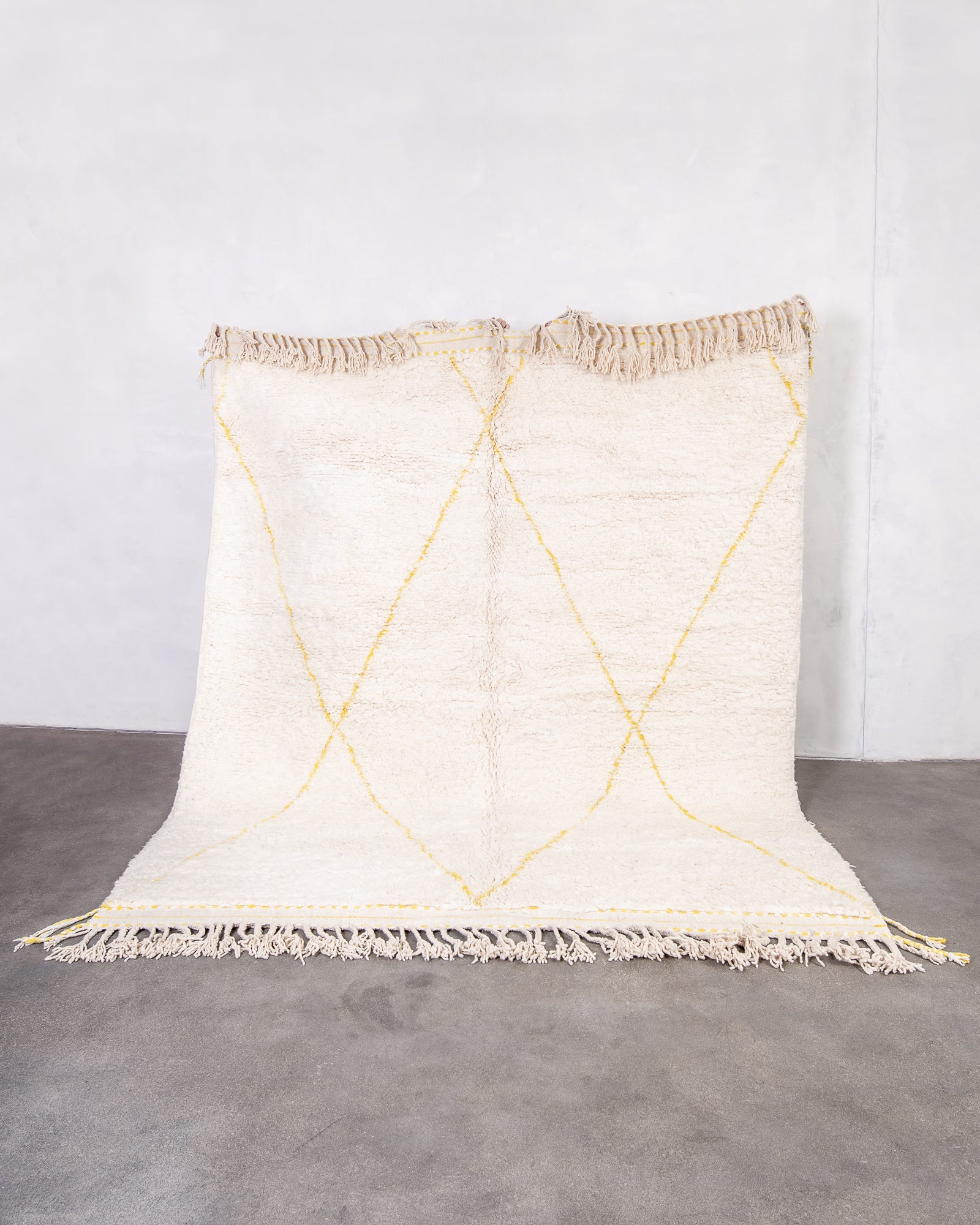 Modern, designer, handcrafted Berber rug from Morocco. Beniourain carpet with beautiful colours and patterns and fluffy wool texture.